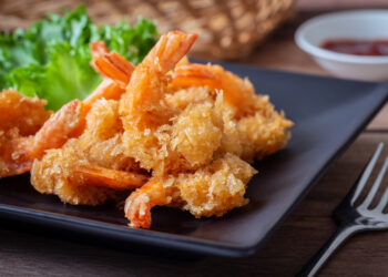 Fried shrimp and vegetable on plate